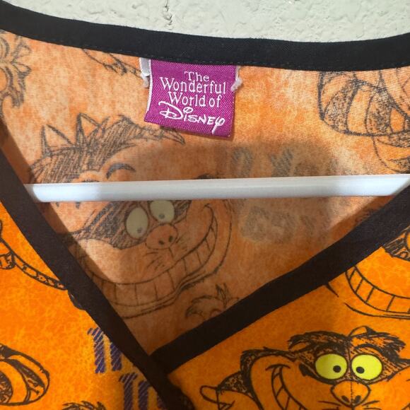 Women's Disney Scrub Top XL Cheshire Cat Alice in Wonderland Halloween Orange - Picture 2 of 5